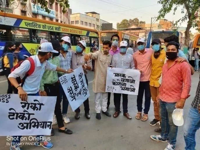 Volunteers with placards during the awareness rally.