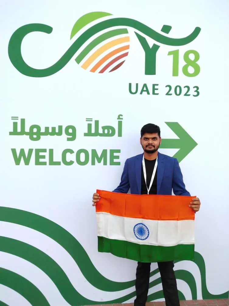 Carrying the Indian flag at COY18.