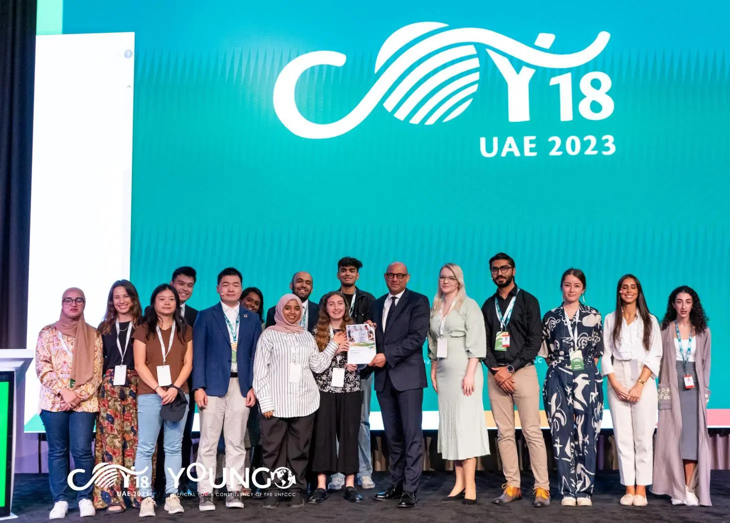 Delegates and guests on stage at COY18.