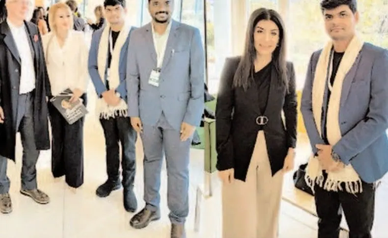 With delegates from other countries.