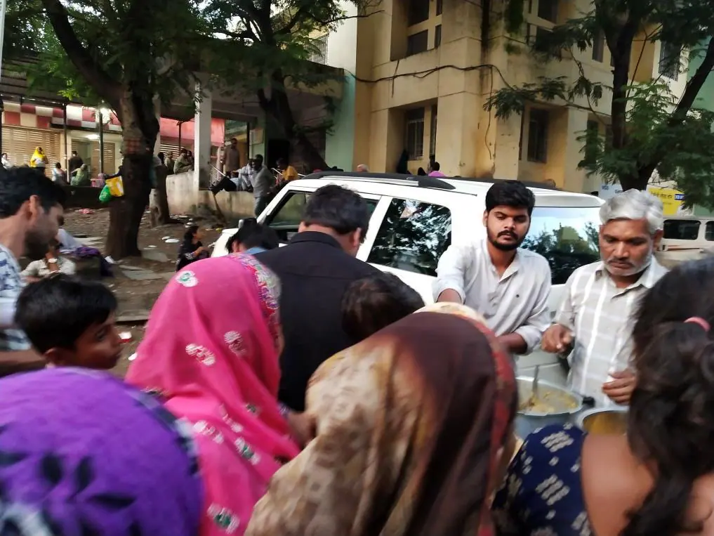 Women and children at a distribution point.